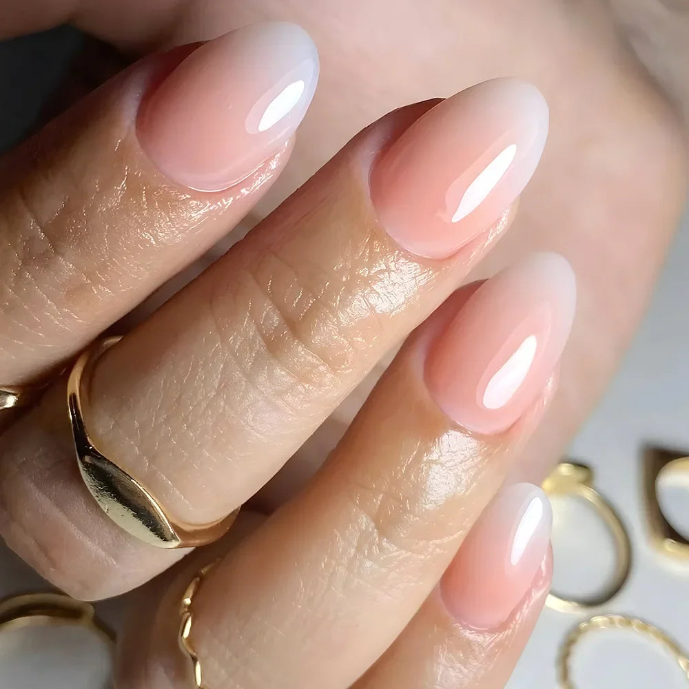 24Pcs Short Oval Head Blush Pink Press on Nails with Simple Designs Almond Nails Wearable Acrylic Full Cover Nail Tips with Glue